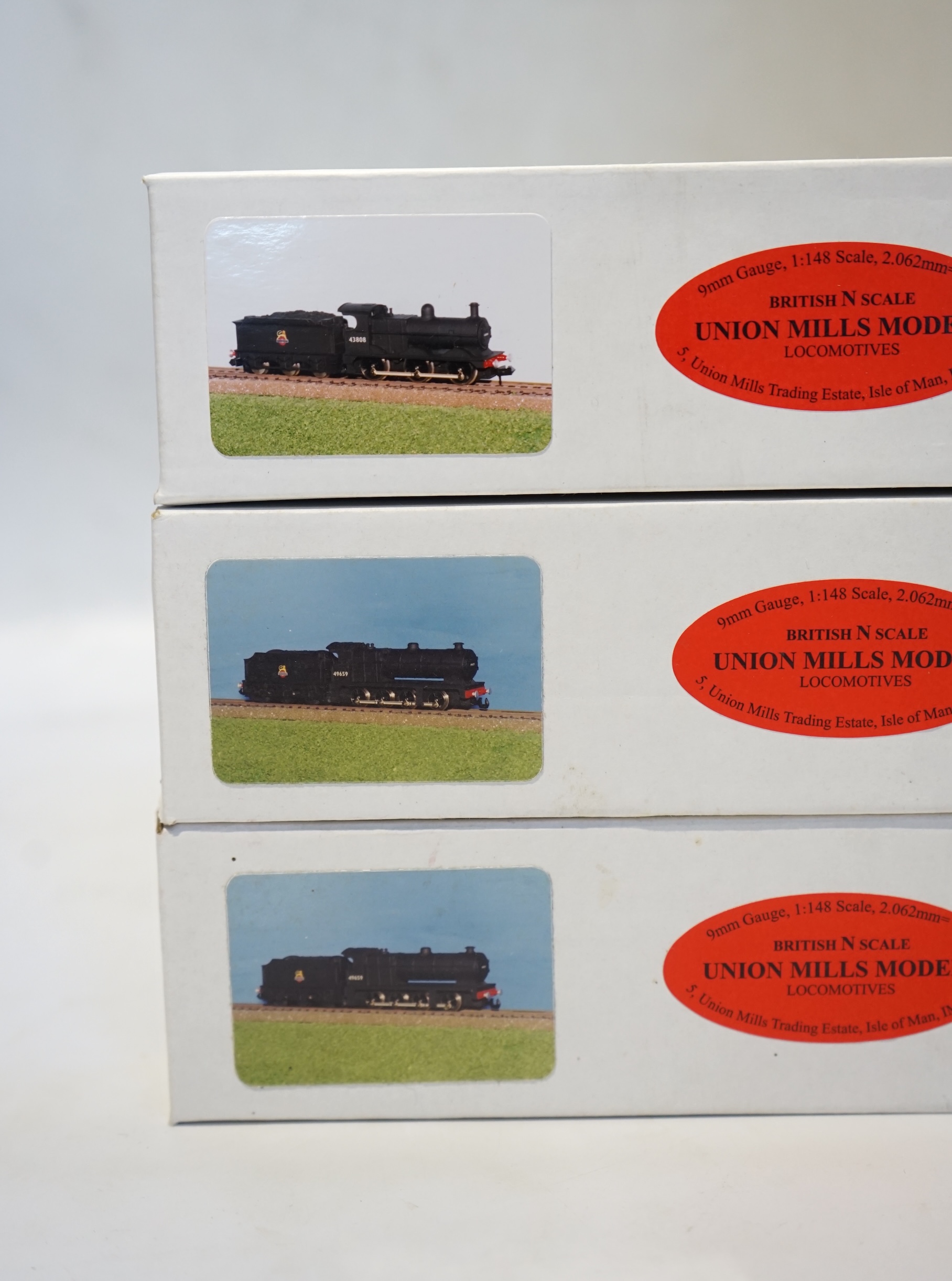 Three boxed Union Mills Models N gauge railway BR locomotives; a Class 7F, 49659, a Class 7F, 49508, and a Class 3F, 43214. Condition - good.